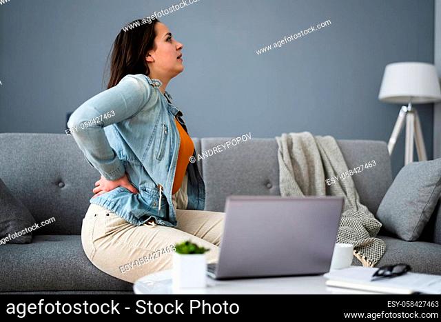 Lower Back Pain. Bad Posture Sitting On Couch