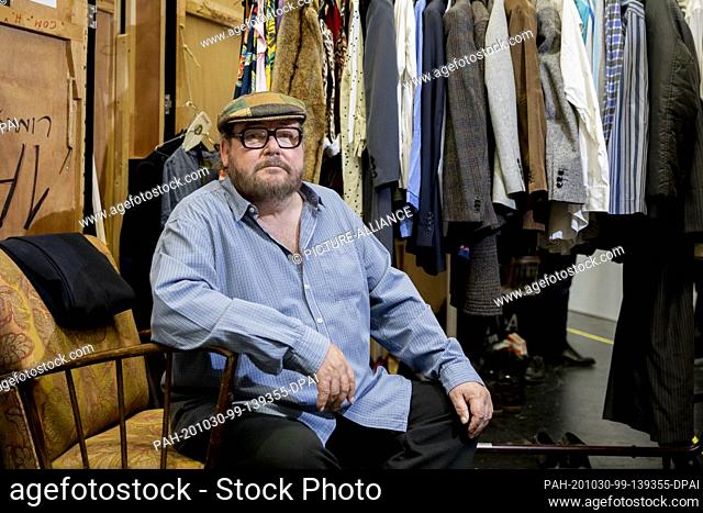 20 October 2020, Berlin: Walter Plathe, actor, sits in the Schiller Theater between the sets and costumes. For years he played the ""country doctor"" on ZDF