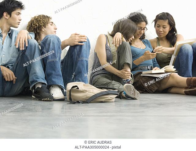 Group of students sitting on the floor