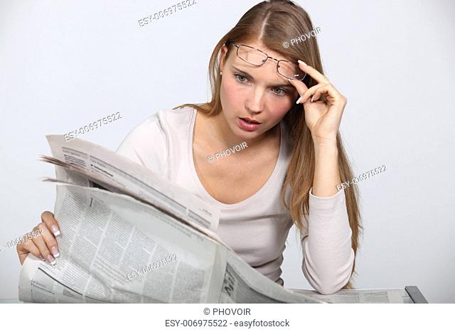 Woman shocked by newspaper article