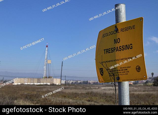 Natural gas production facility operating on ecological reserve. Ballona Wetlands, Playa Del Rey, Los Angeles, California, USA