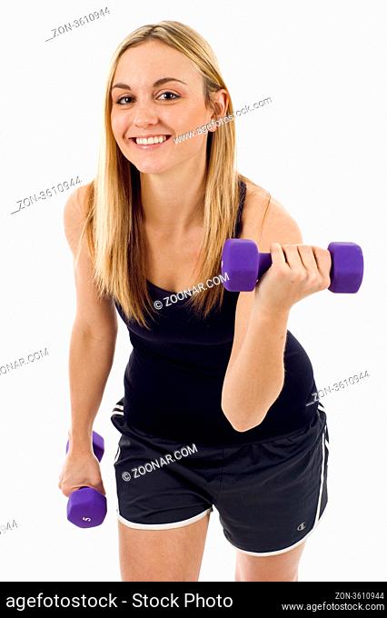 Woman working out at the gym isolated over white background