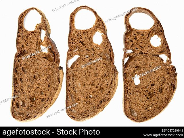 sliced bread made from rye flour isolated on white background, top view