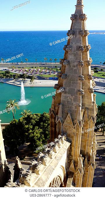 Parq de la Mar, public park with a lake inside seen from the upper part of the cathedral of Palma de Majorca, capital city oof the balearic island of Majorca