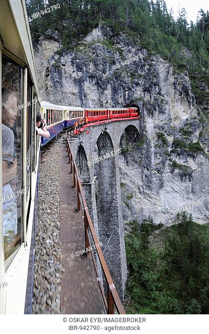 RhB, Rhaetian Railway train crossing the Landwasser Viaduct near Filisur, Albula section, Filisur, Graubuenden, Switzerland, Europe