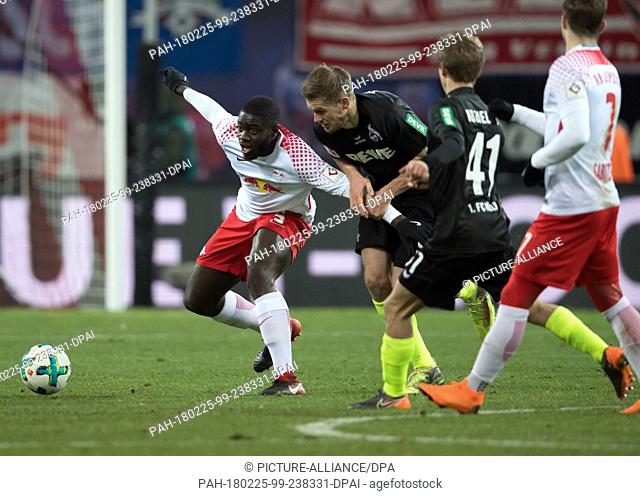 25 Febuary 2018, Germany, Leipzig: German Bundesliga soccer match between RB Leipzig and 1. FC Cologne, Red Bull Arena: Leipzig's Dayot Upamecano (L) and...