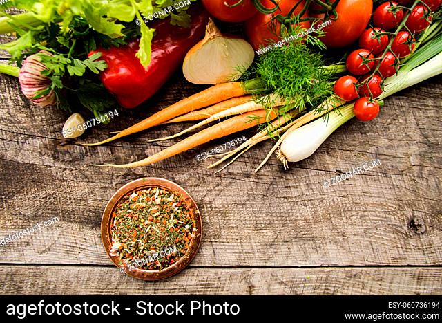 Colorful spice mix of dry vegetables, ground. Mixture of ten vegetables, homemade seasoning for soup. Fresh vegetables, used as components of condiment