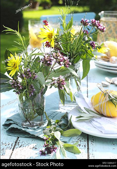 Wild flowers and herbs as table decorations