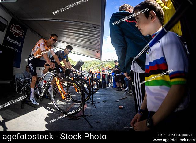 Dutch cyclist Mathieu van der Poel, left, prepares before the World Mountain Bike Championships in Tweed Valley, Scotland, on August 12, 2023