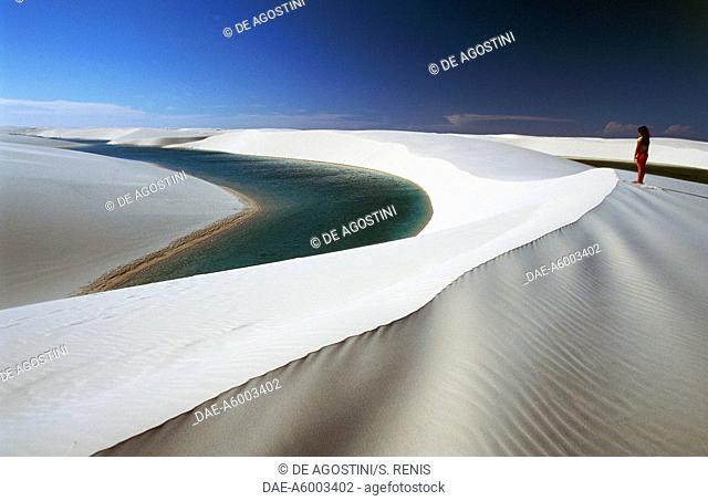 The sand dunes known as white sheets (lencois) and freshwater lakes of changing colours, formed by precipitation, Lencois Maranhenses National Park