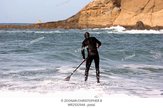 Man Black Wetsuit Ocean Surf Riding Paddle Board Summer Sport