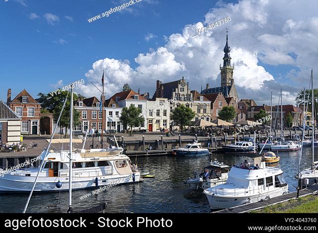 Cityscape at the marina with historic town hall, Veere, Zeeland, Netherlands, Europe | Cityscape at the marina of Veere with historic town hall