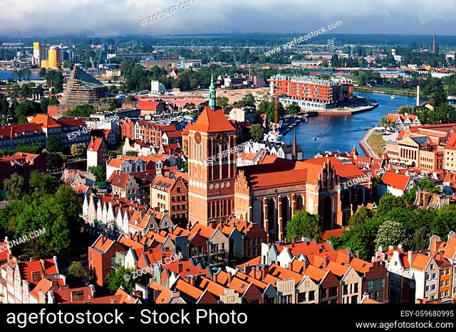 Gdansk city from above in Poland, view over the Old Town with St. John's Church and historic red tiled houses
