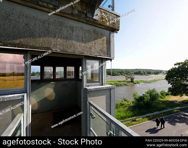 27 May 2022, Brandenburg, Lenzen (Elbe): The former watchtower of the GDR border troops on the Elbe near the pier of the Pevestorf-Lenzen ferry