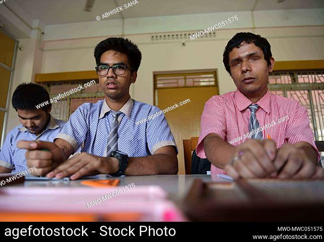 Visually impaired students studying during a special class on the eve of International Literacy day at the Institute for the empowerment of persons with visual...
