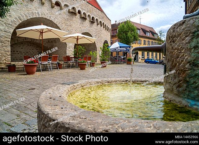 The historic old town of Dettelbach am Main in Lower Franconia with picturesque buildings within the town wall