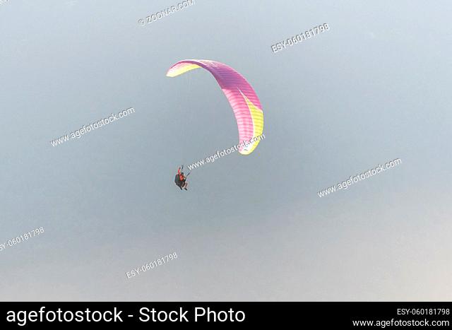 Paragliding flight in the air over the mountains. Drôme, France