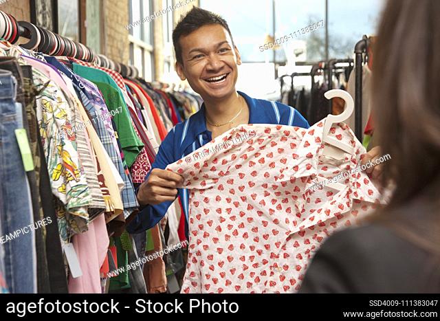 Malaysian man shopping in vintage store
