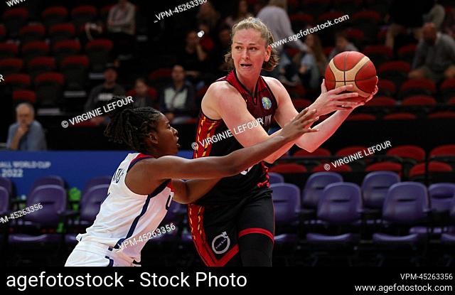 American Ariel Atkins and Belgium's Emma Meesseman fight for the ball during a basketball game between USA and Belgium's national team The Belgian Cats