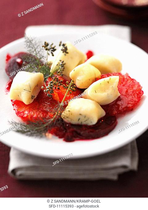 Gnocchi on a beetroot and blood orange salad with herbs