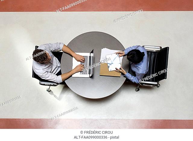 Interns working in shared office space