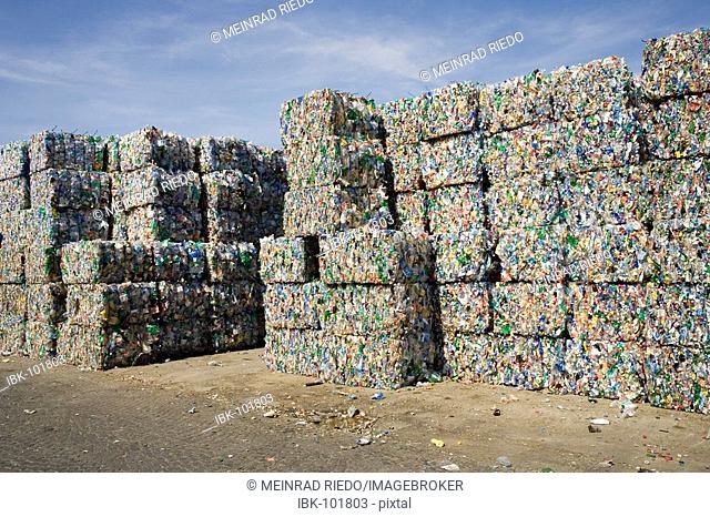 Plastic bottles, sorted, compressed into bales and ready for recycling