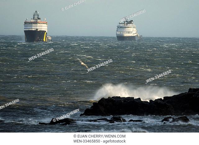 Boats make it through the choppy waves as Storm Caroline brings winds Gusts of wind that reach 70 to 80 mph in Aberdeen. Featuring: Atmosphere Where: Aberdeen