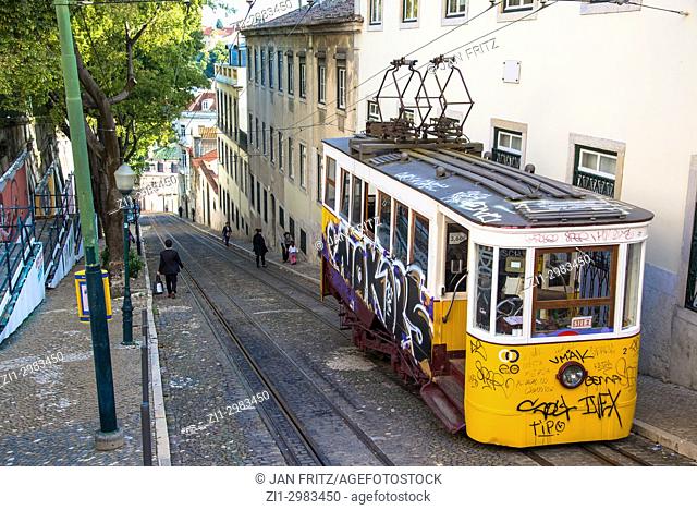 famous yellow tram with grafitti in Lisbon, Portugal