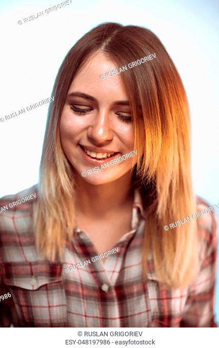 portrait smiling girl on white background in studio
