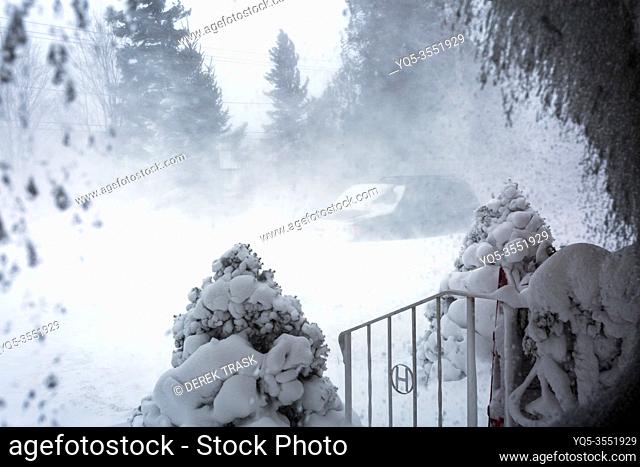 view from window showing blowing snow and strong winds. Meaford; Ontario; Canada