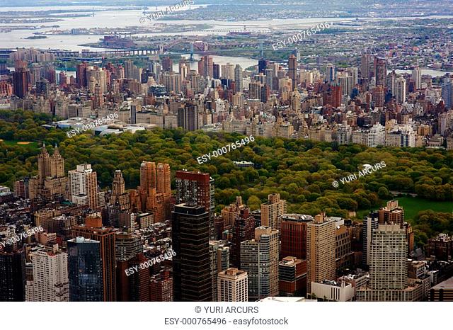 Aerial view of central park surrounded with big buildings - New York