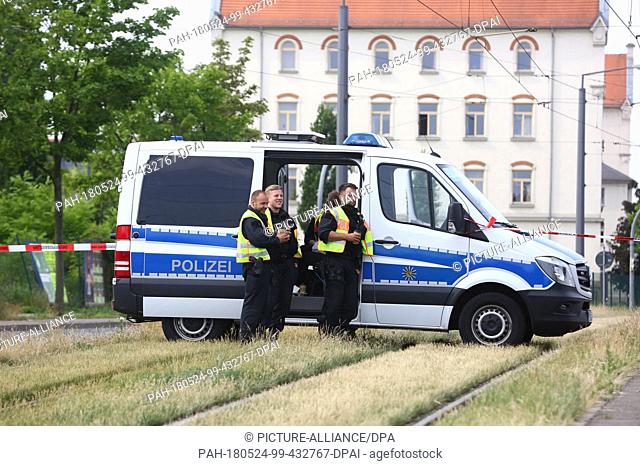 24 May 2018, Germany, Dresden: Police securing a trap circuit. Danger has not been completely averted after the part detonation of an aircraft bomb found in...