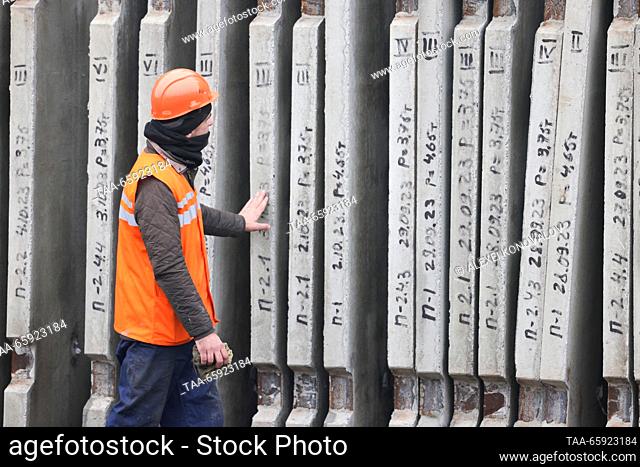 RUSSIA, ZAPOROZHYE REGION - DECEMBER 19, 2023: An employee is at work at a plant of reinforced concrete structures in the city of Berdyansk
