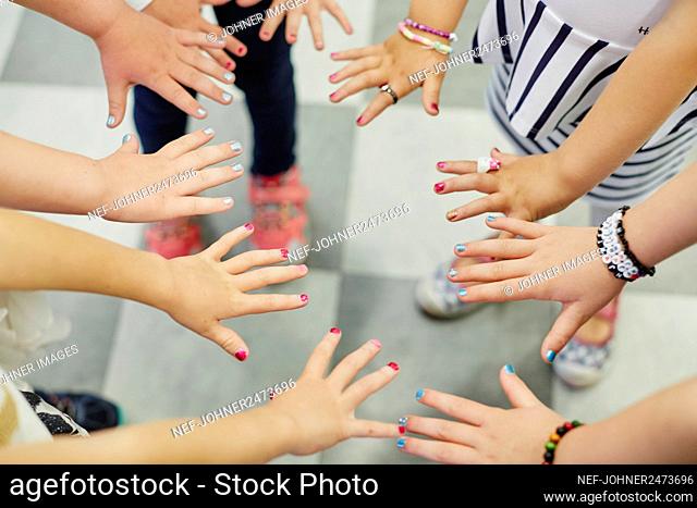 Girls showing painted nails