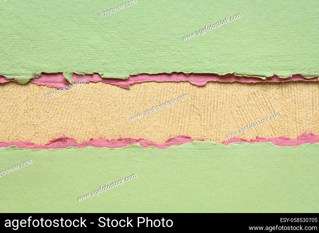 paper abstract in green, beige and pink with a copy space - sheets of handmade rag and bark paper, blank web banner