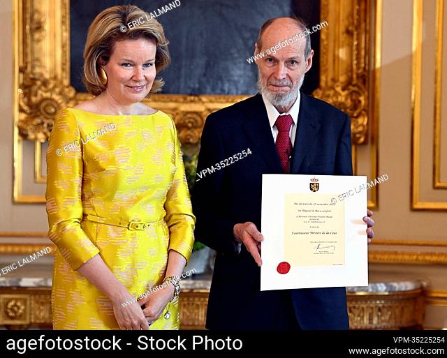 Queen Mathilde of Belgium and Christian Vanden Breede of EGE Stienon pictured during a royal reception with the newly appointed suppliers holding a 'Royal...