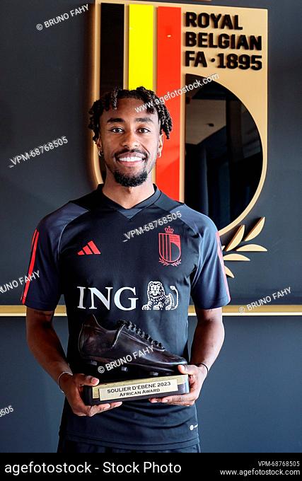 Belgium's Mike Tresor poses with his Ebony shoe trophy after a press conference of Belgian national soccer team Red Devils, Tuesday 13 June 2023