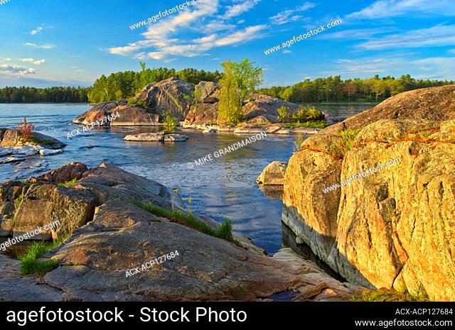 Rock. The flow of water narrows between Lovesick Lake and Lower Buckhorn Lake on the west and Stoney Lake to the east creating Burleigh Falls