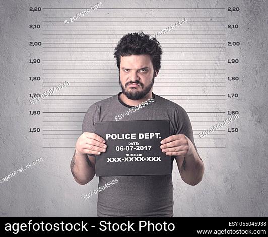 Caught gangster in jail with table on his hand