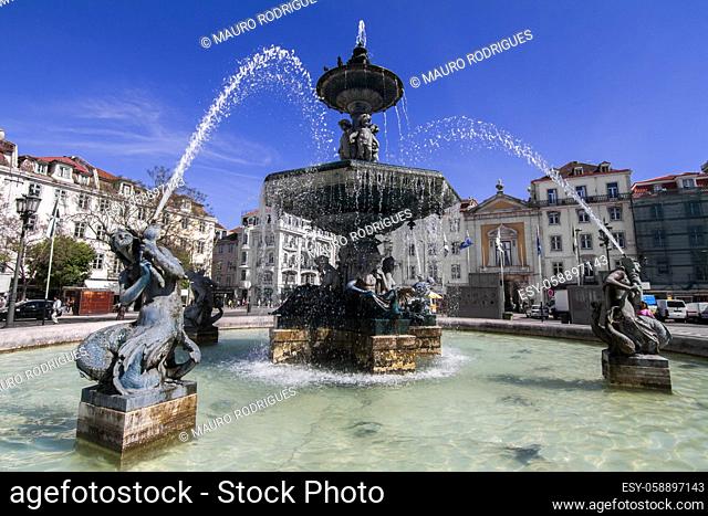 View of the beautiful center fountain in the Rossio square located in Lisbon, Portugal