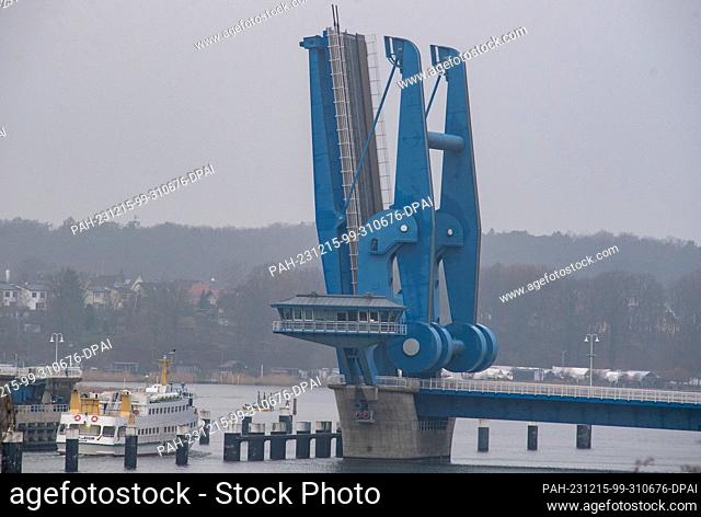 15 December 2023, Mecklenburg-Western Pomerania, Wolgast: An excursion steamer sails in front of the Peene shipyard. Photo: Stefan Sauer/dpa/ZB
