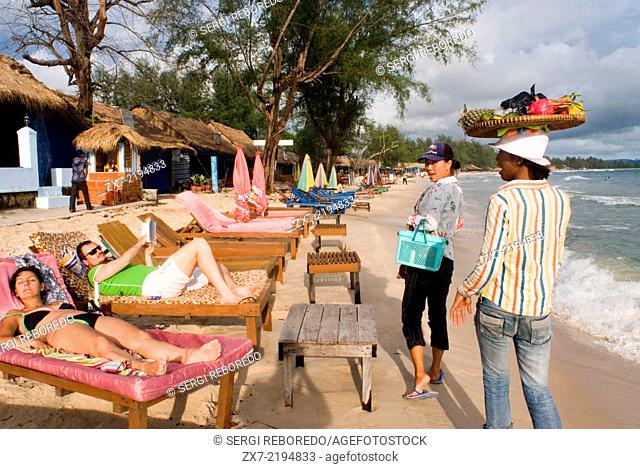 Fruit sellers on the beach in Sihanoukville. Sihanoukville, it’s the 4th largest city in Cambodia but it’s really a beachside town, and it is incredible