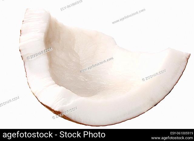 Piece of coconut meat (Cocos nucifera shelled fruit kernel), broken, irregular shaped