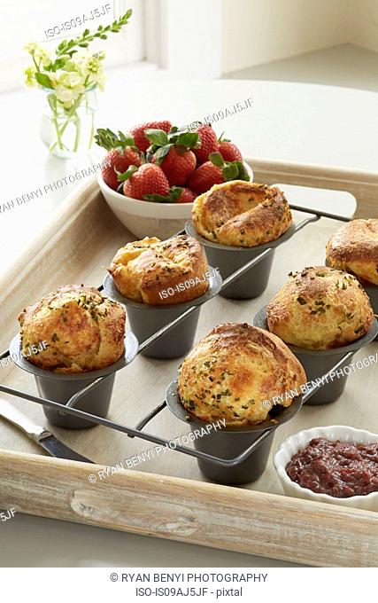 Cheddar chive popovers served with a fresh strawberry chutney