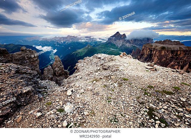 Cloudy and foggy sunrise at Dolomites mountains