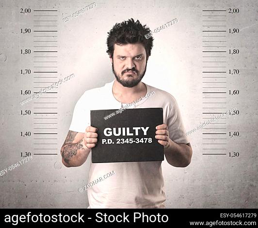 Caught guilty man with ID signs on his hand