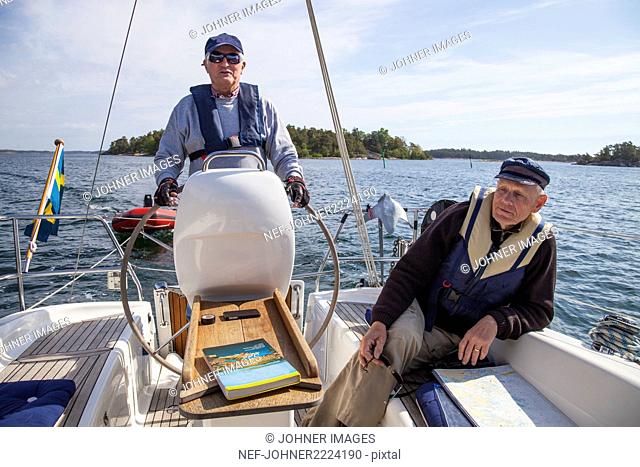 Senior men on boat
