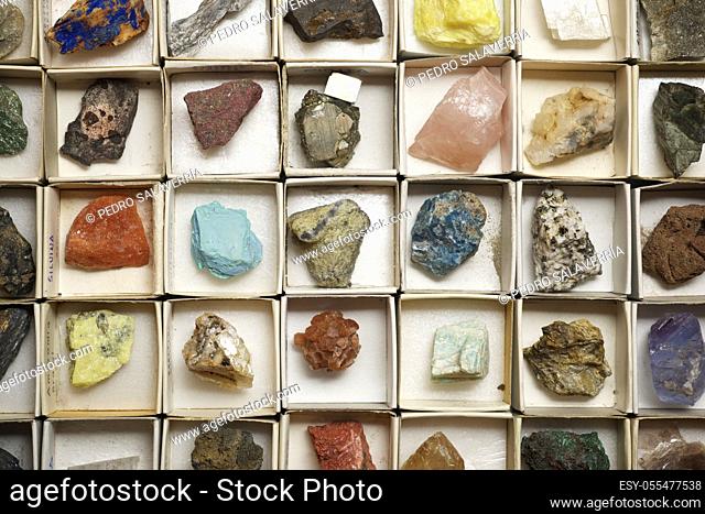 Collection of minerals in cardboard boxes