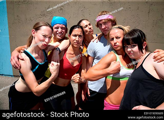 Runners pose for muscle shot