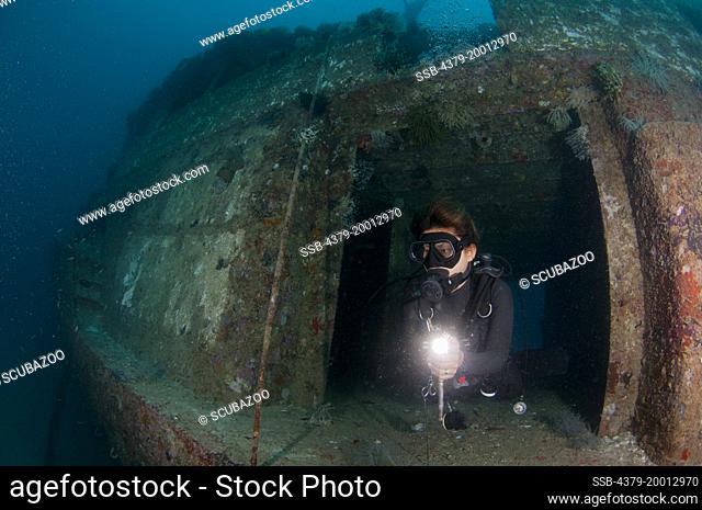Kapalai wreck, Diver exiting the wreck, Kapalai, Sabah, Borneo, Malaysia